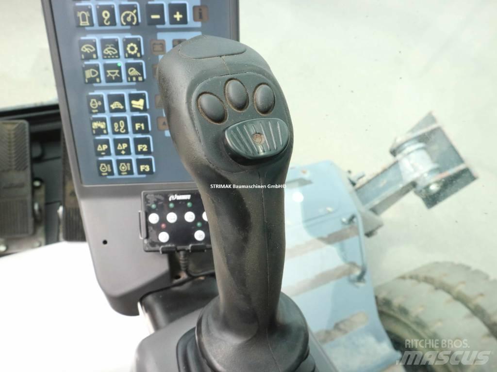 Atlas 180 MH حفارات بعجل