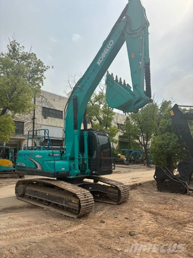 Kobelco SK210 حفارات زحافة