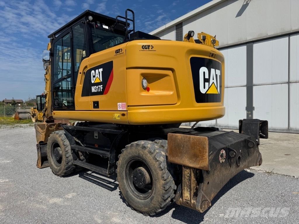 CAT M317F حفارات بعجل