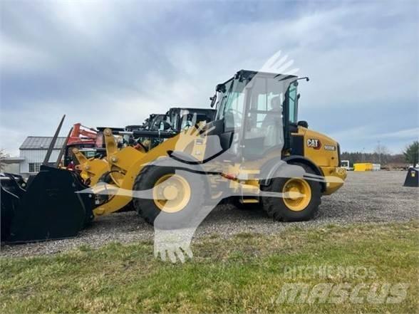 CAT 908M لوادر بعجل