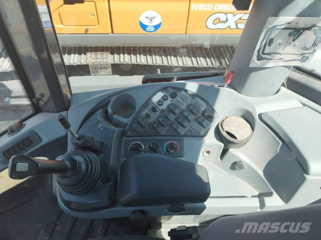 New Holland W 130 لوادر بعجل