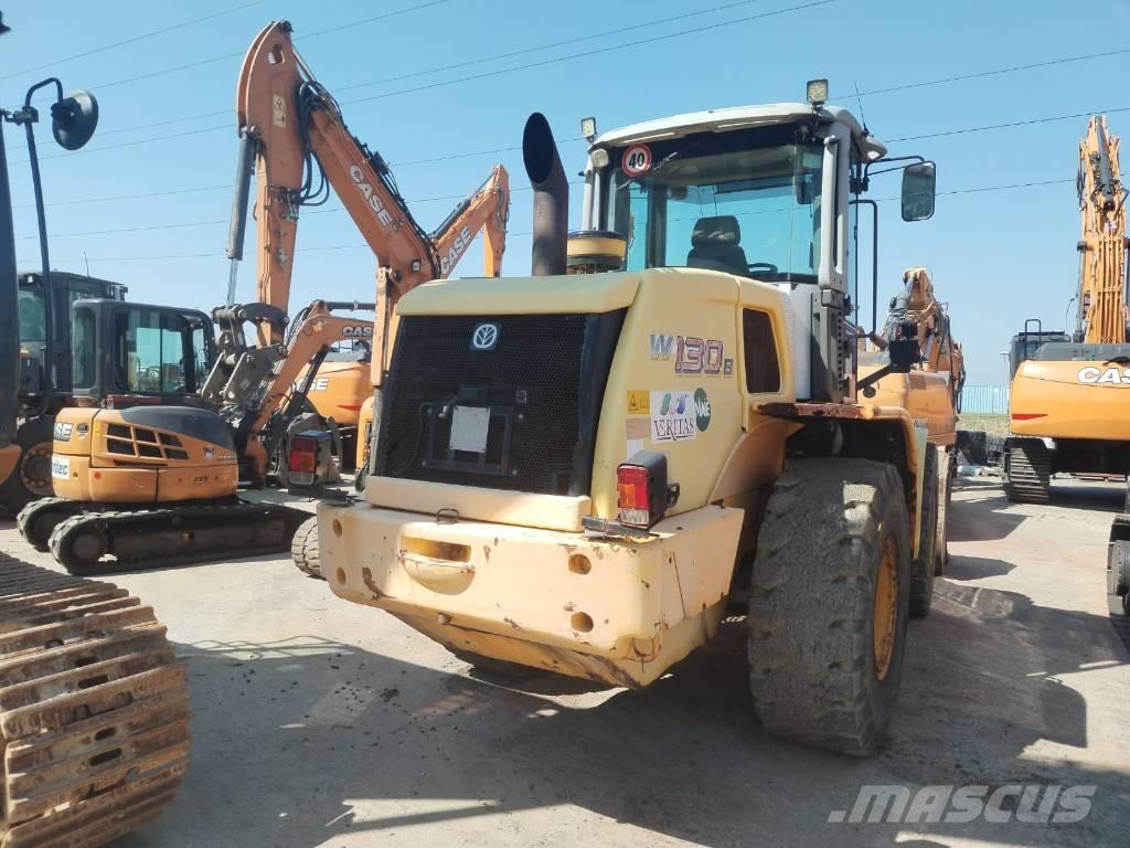 New Holland W 130 لوادر بعجل