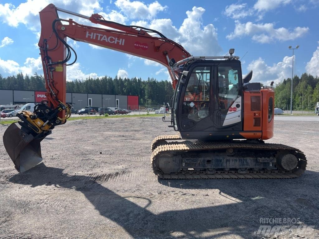 Hitachi ZX 135 US-6 حفارات زحافة
