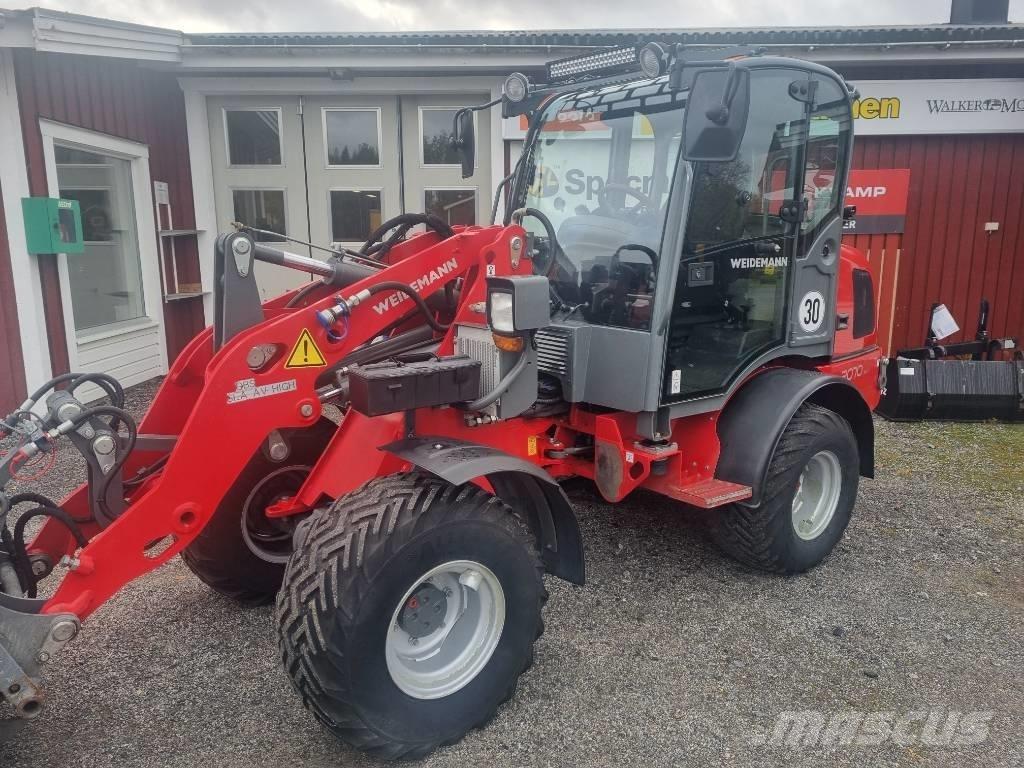 Weidemann 2070 CX80 لوادر بعجل