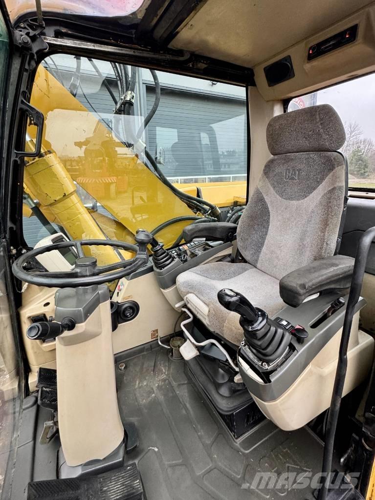 CAT M 316 C حفارات بعجل