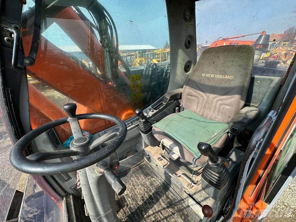 New Holland MH Plus حفارات بعجل