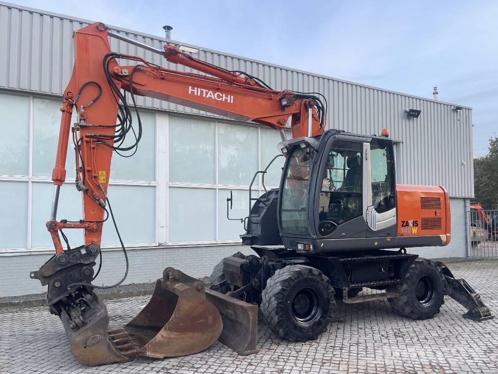Hitachi ZX 140 W-3 حفارات بعجل