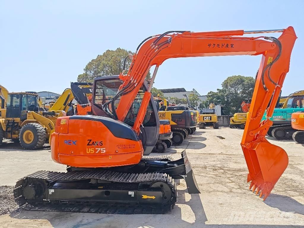 Hitachi ZX 75 US حفارات وسط 7 طن - 12 طن