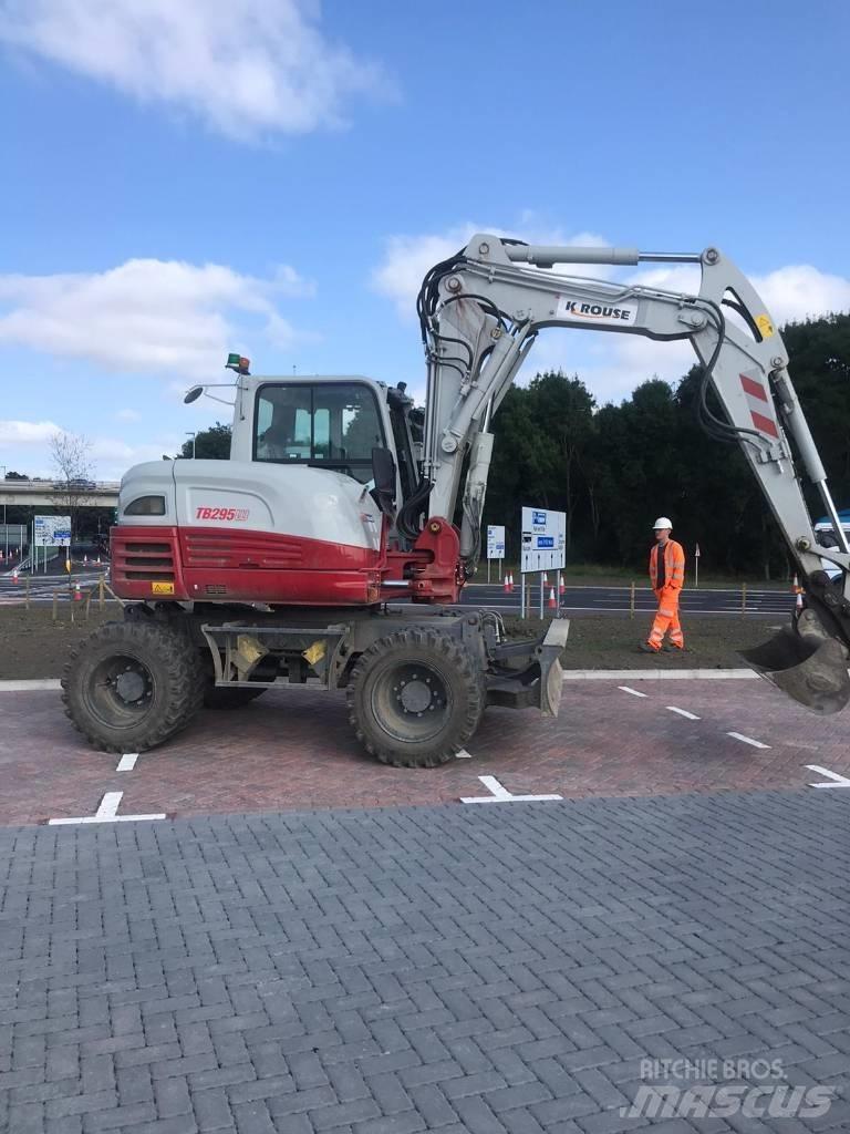 Takeuchi TB295W حفارات بعجل