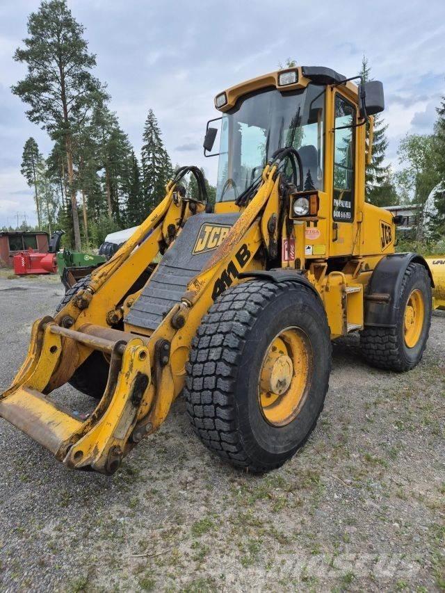 JCB 411B لوادر بعجل