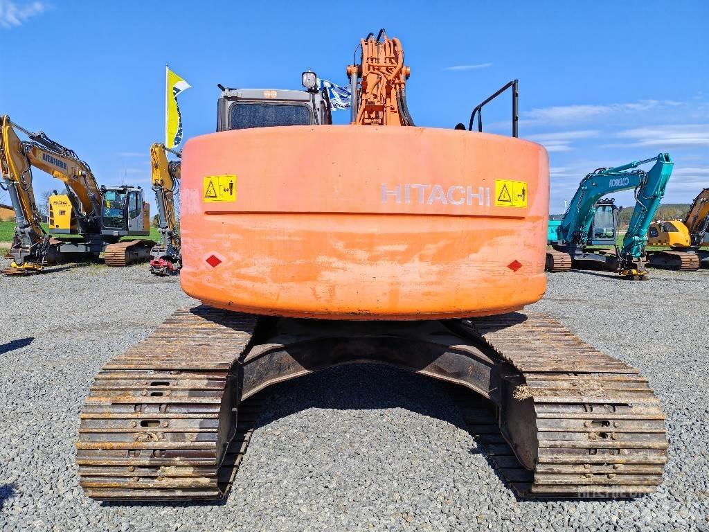 Hitachi ZX 225 US حفارات زحافة