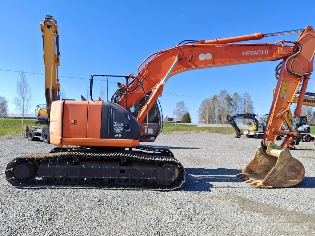 Hitachi ZX 225 US حفارات زحافة