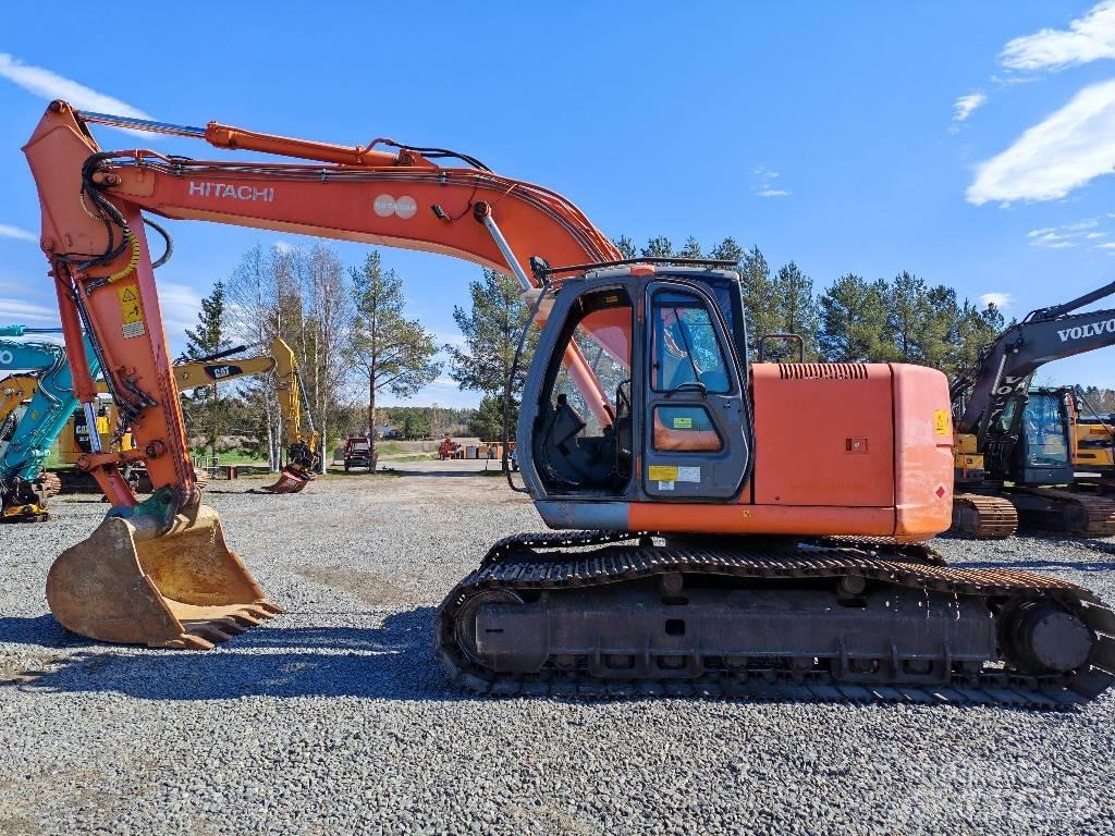 Hitachi ZX 225 US حفارات زحافة