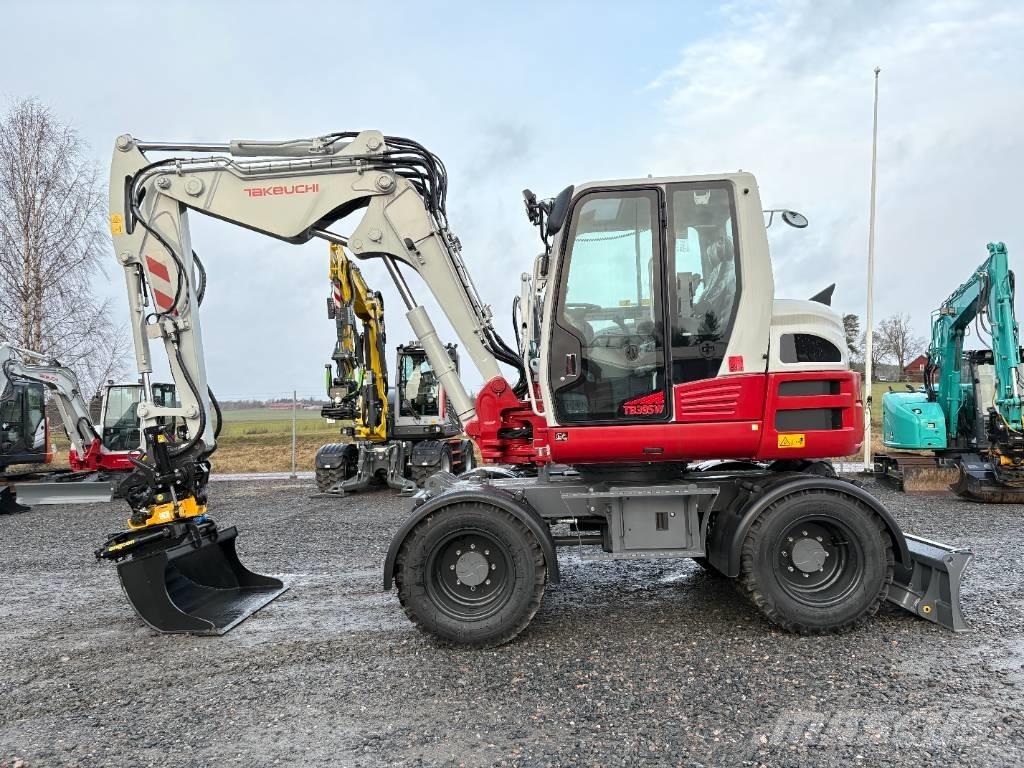 Takeuchi TB395W حفارات بعجل