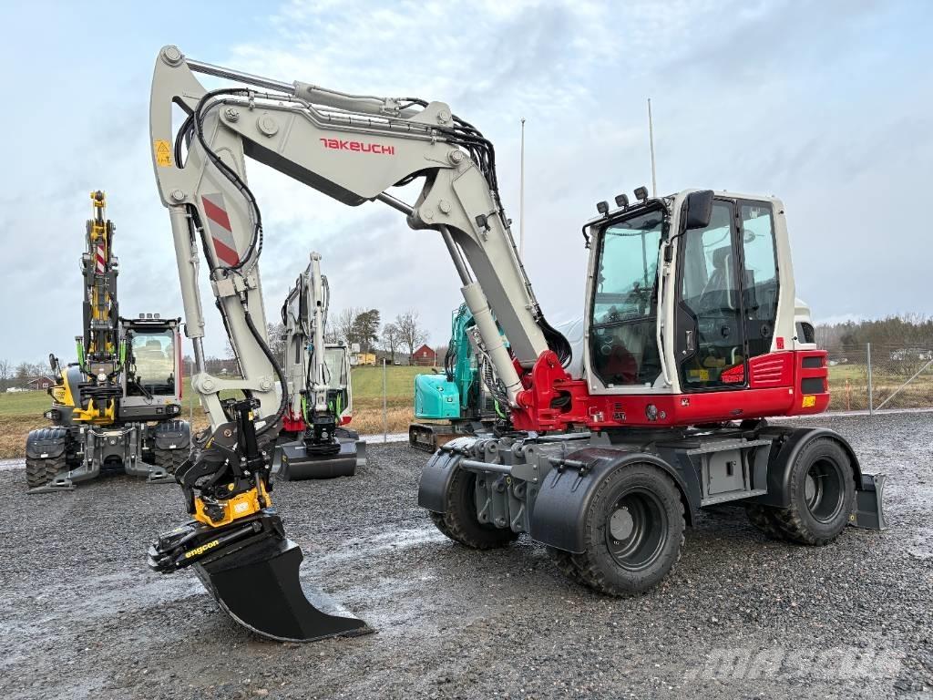 Takeuchi TB395W حفارات بعجل