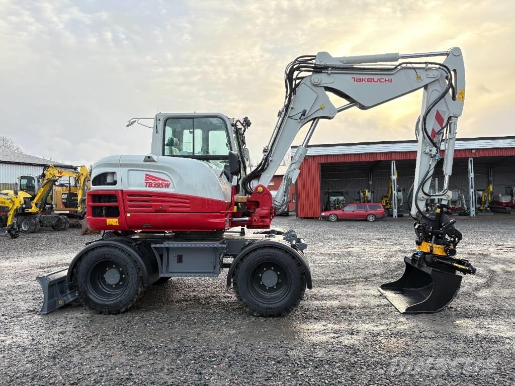 Takeuchi TB395W حفارات بعجل