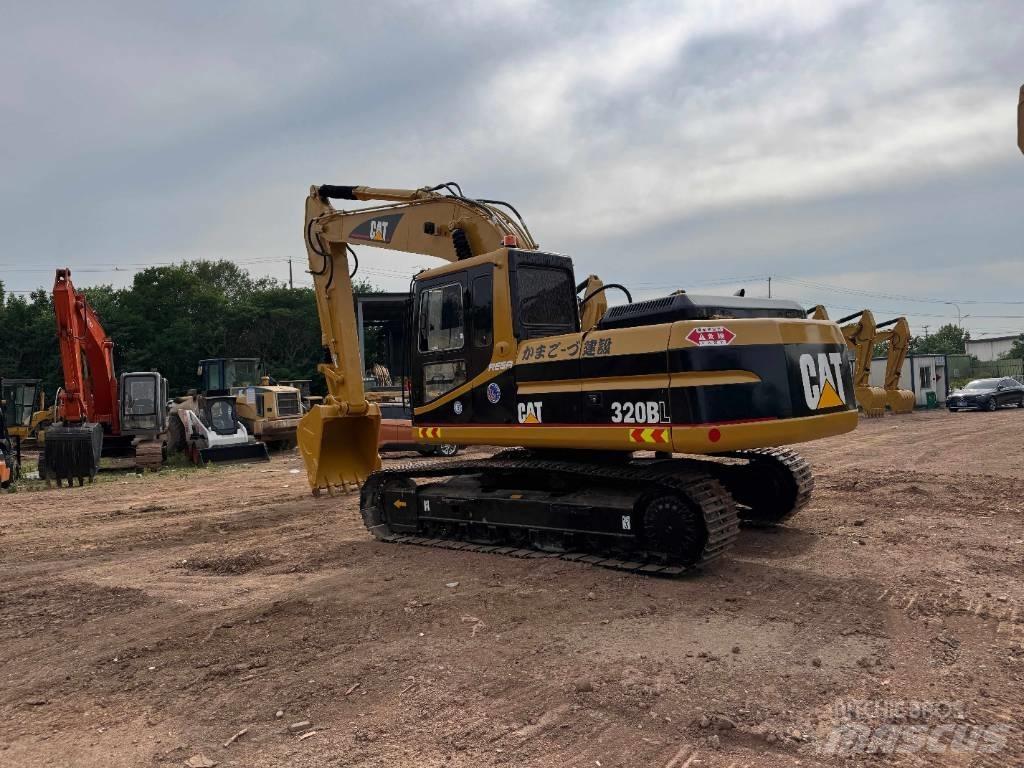 CAT 320 B L حفارات زحافة
