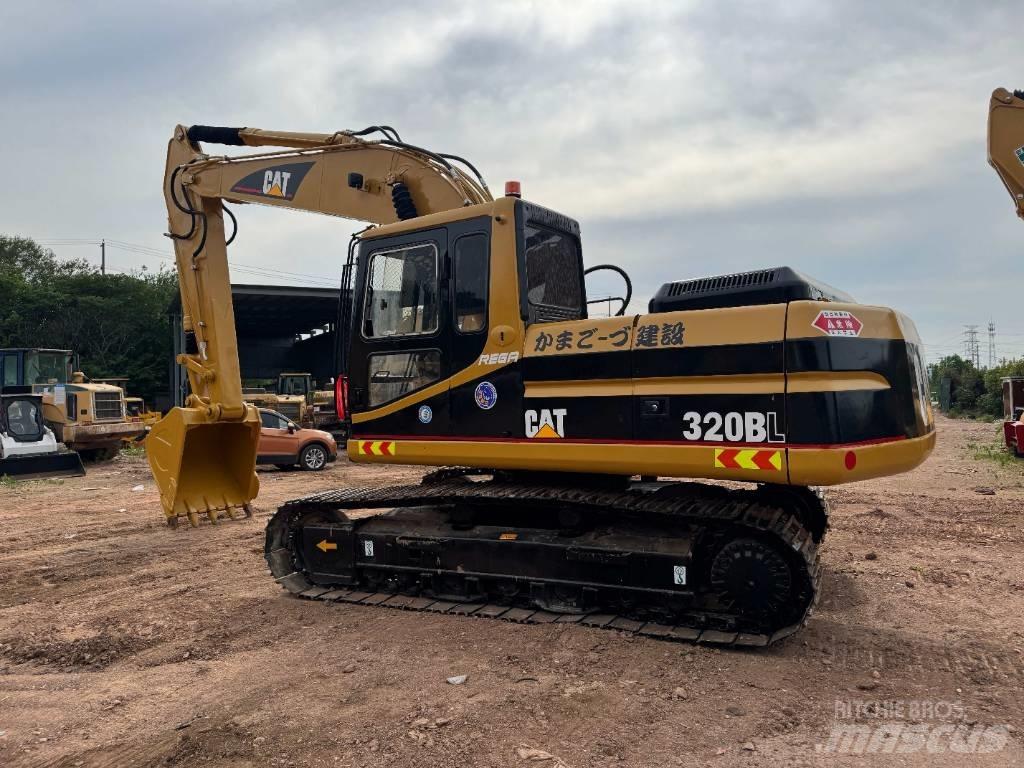 CAT 320 B L حفارات زحافة