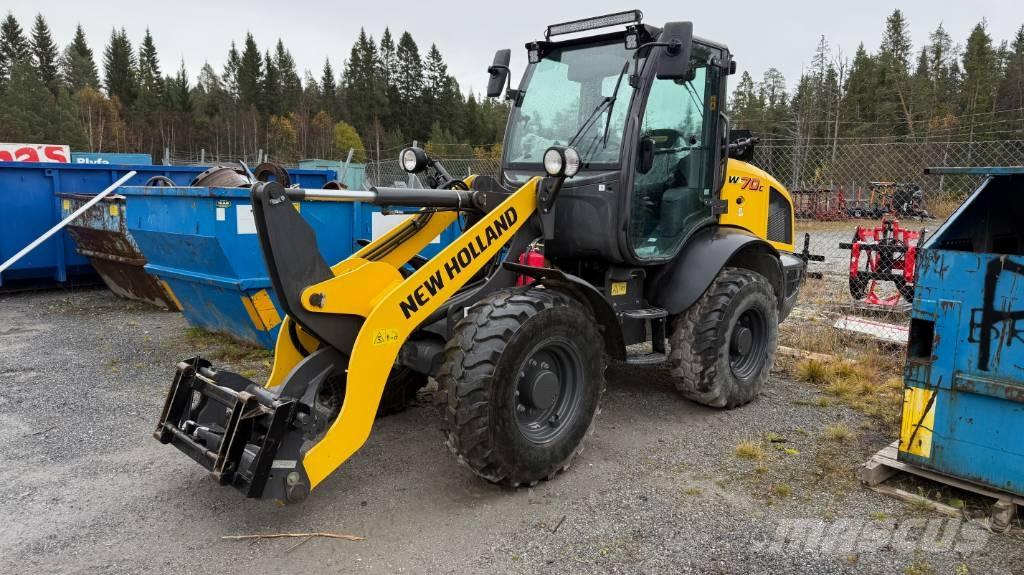 New Holland W70C لوادر بعجل