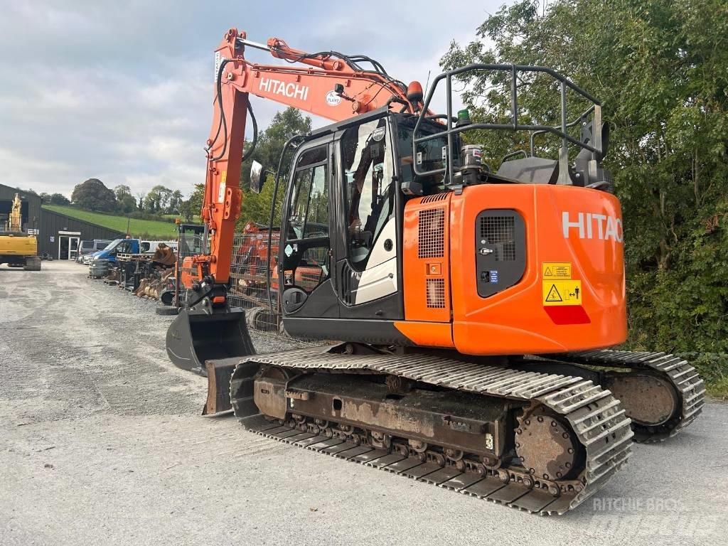 Hitachi ZX 135 US-6 حفارات زحافة