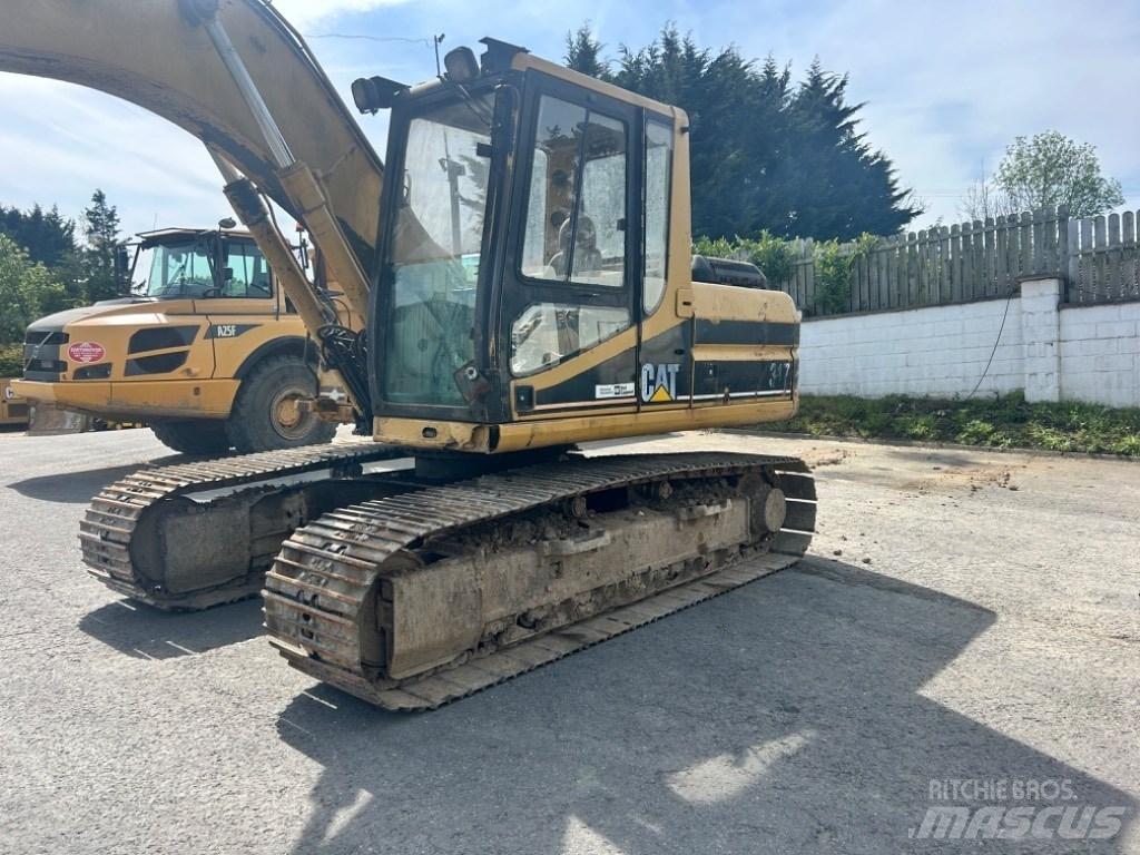 CAT 317 حفارات زحافة