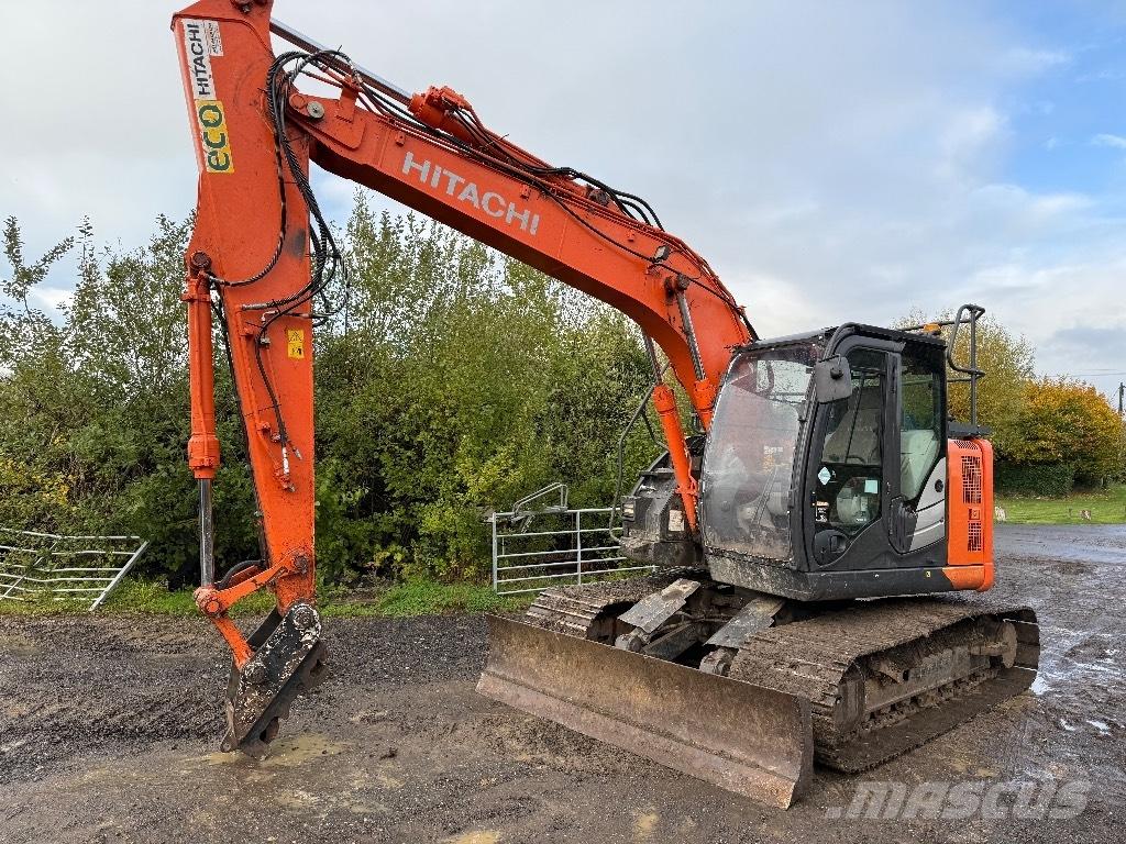 Hitachi ZX 135 US-6 حفارات زحافة