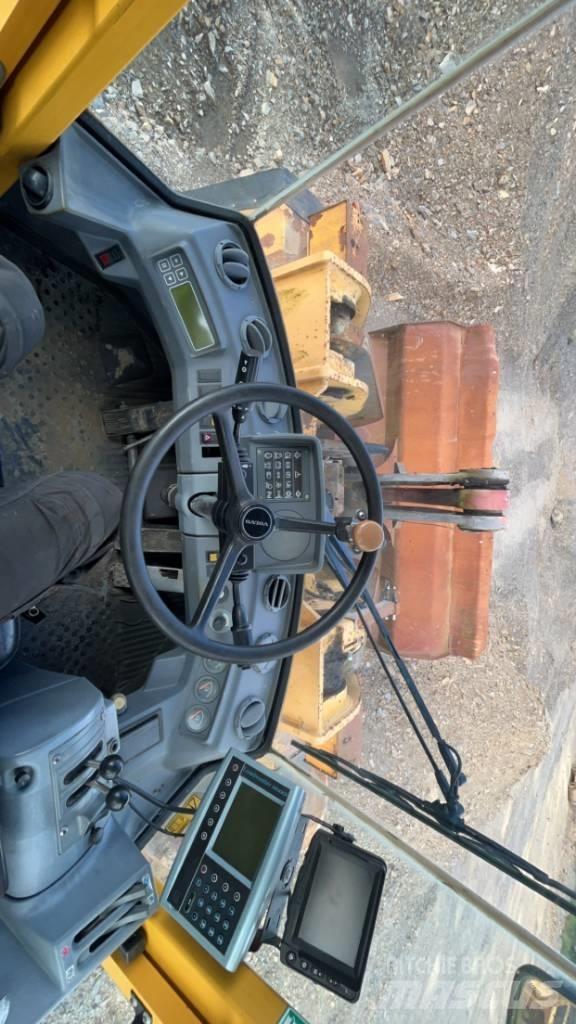 Volvo L 180 C لوادر بعجل