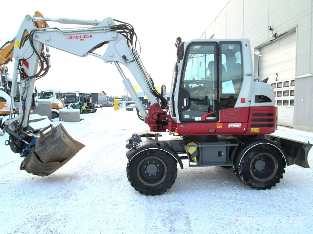 Takeuchi TB 295 W حفارات بعجل