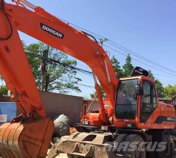 Doosan DH210W\ حفارات بعجل