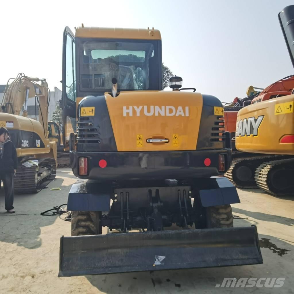 Hyundai R60W-9 حفارات بعجل