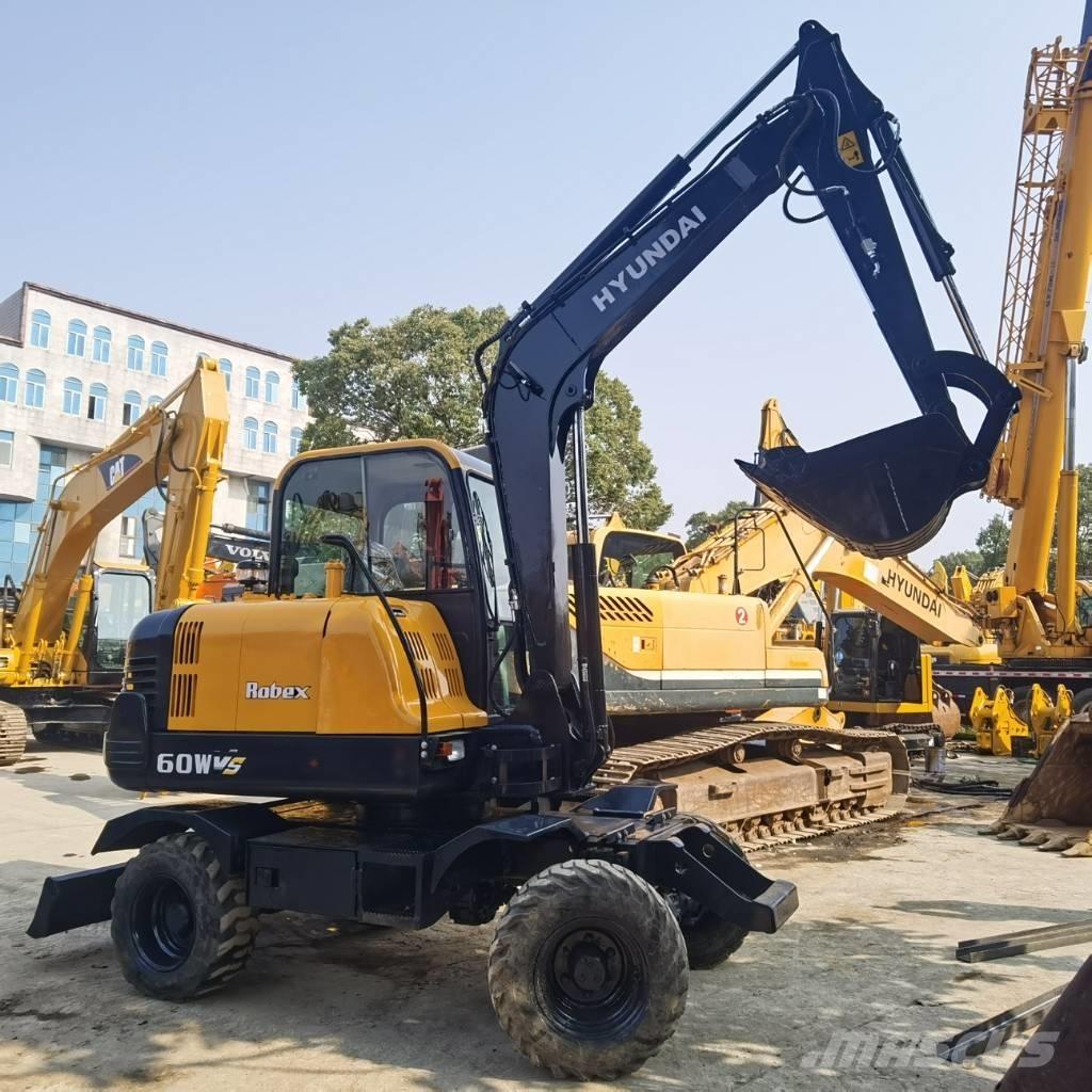 Hyundai R60W-9 حفارات بعجل