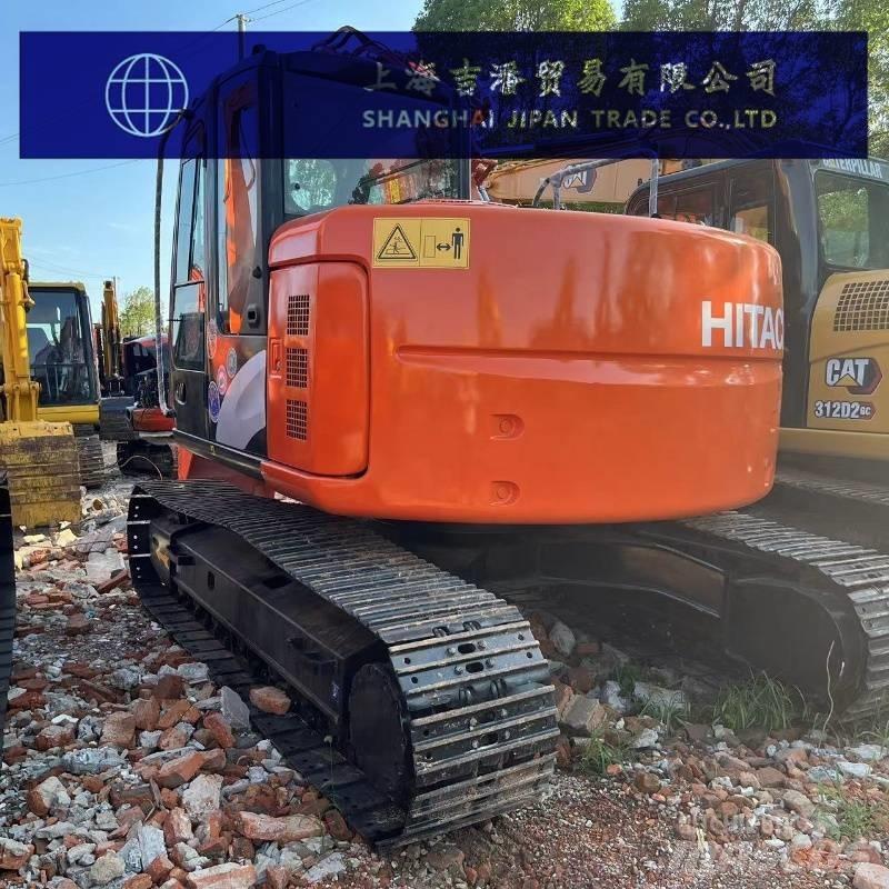Hitachi ZX 135 حفارات زحافة