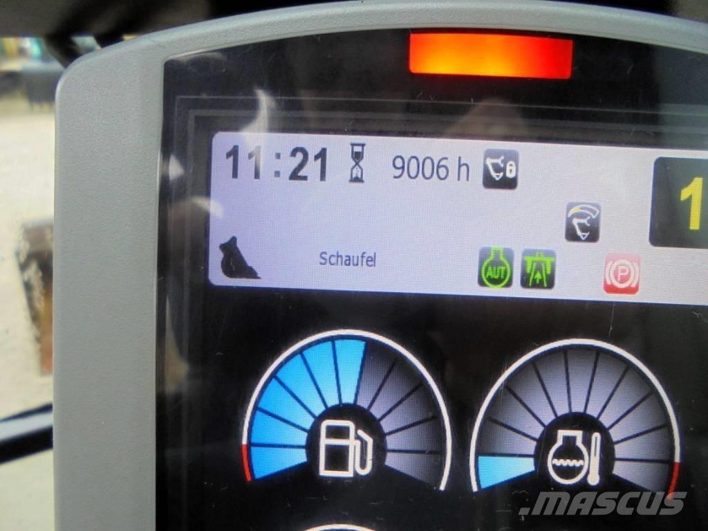 CAT M 318 F حفارات بعجل