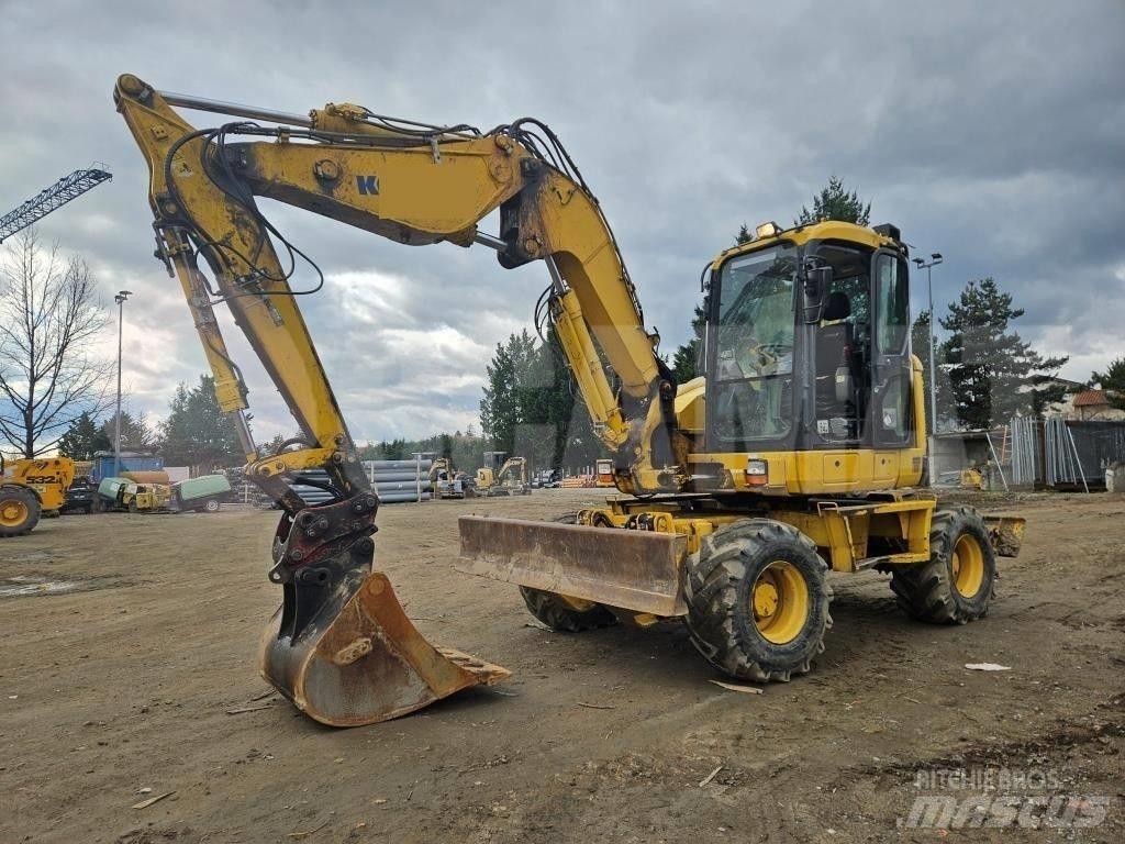 Komatsu PW 118 حفارات بعجل