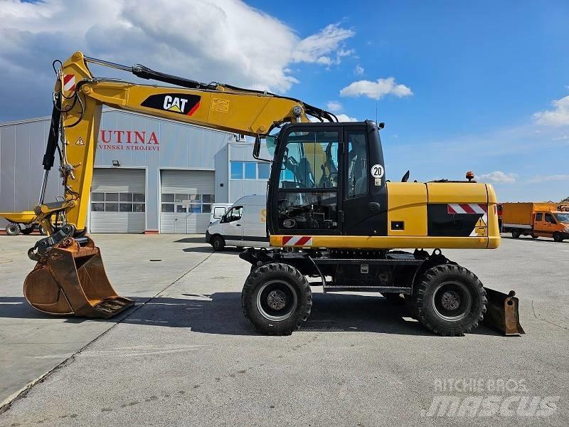 CAT M 315 D حفارات بعجل