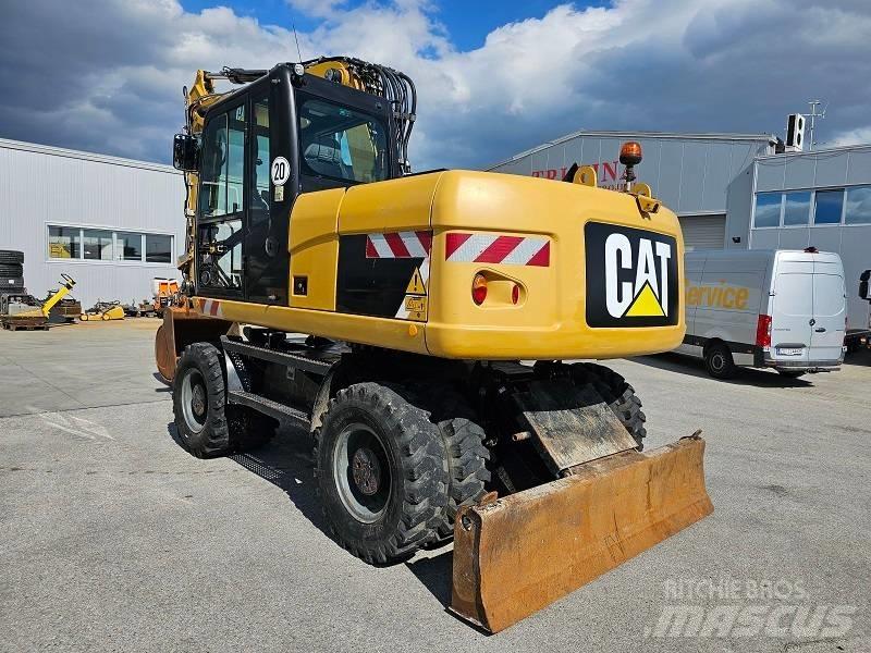 CAT M 315 D حفارات بعجل