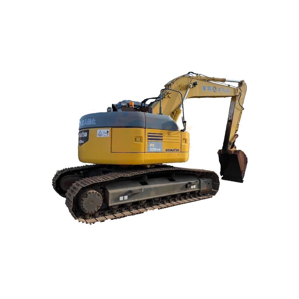 Komatsu PC 228 US حفارات زحافة