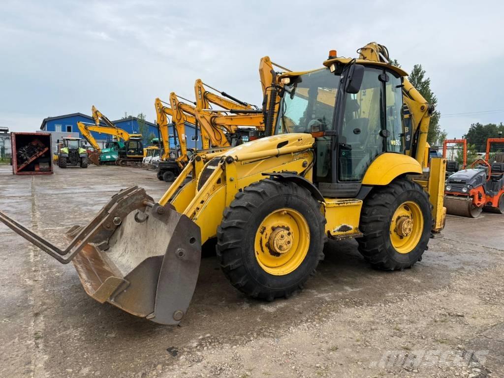 Komatsu WB 93 S-5 لوادر ذات جرافات عكسية