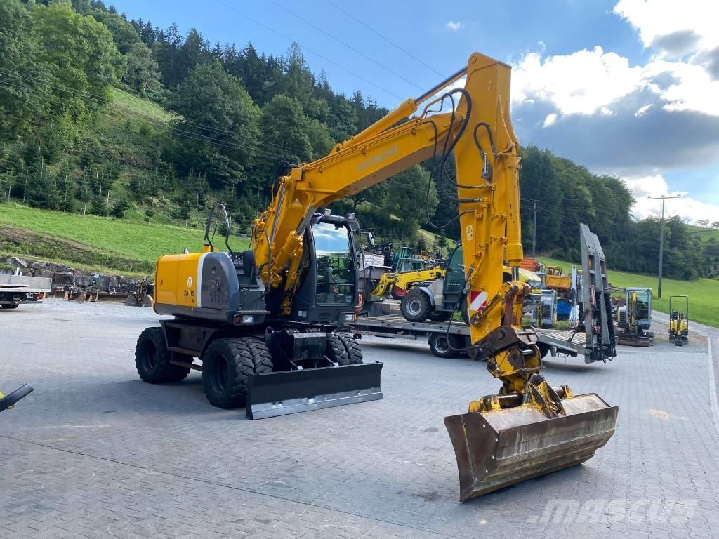 Hitachi ZX 140 W-3 حفارات بعجل