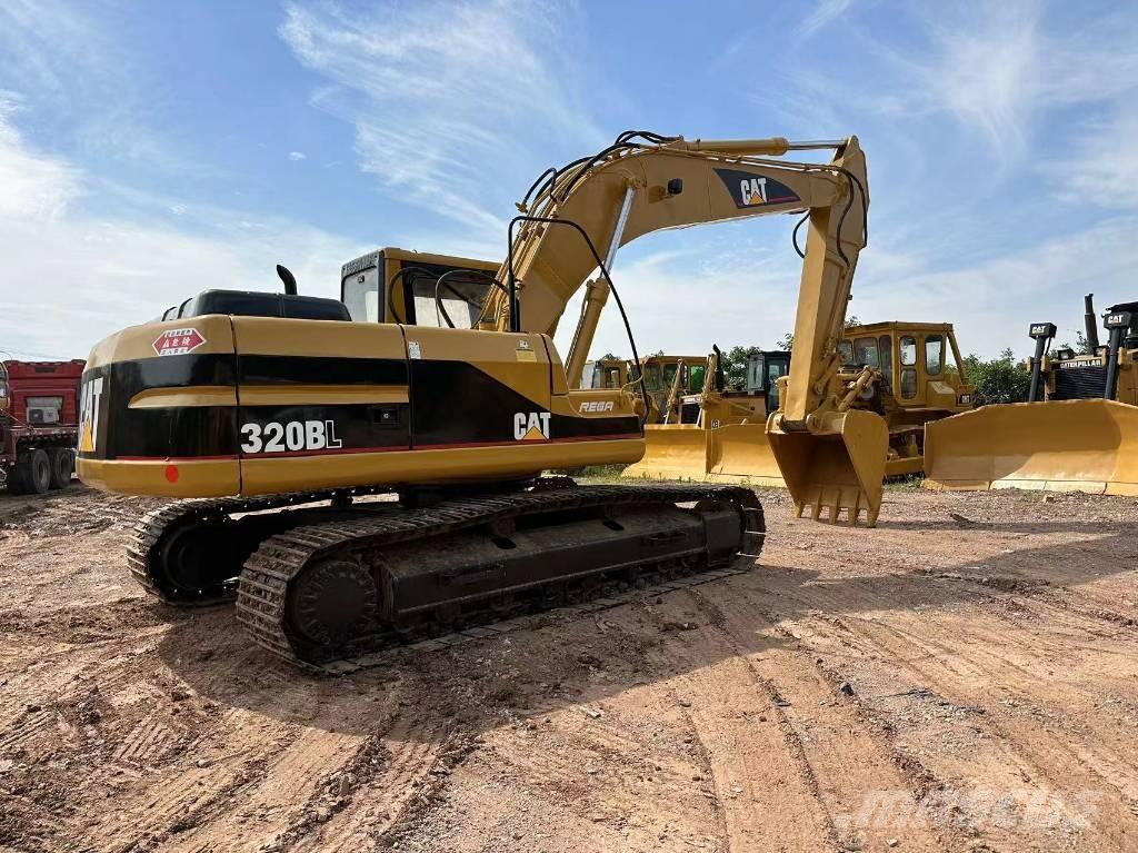 CAT 320BL حفارات زحافة
