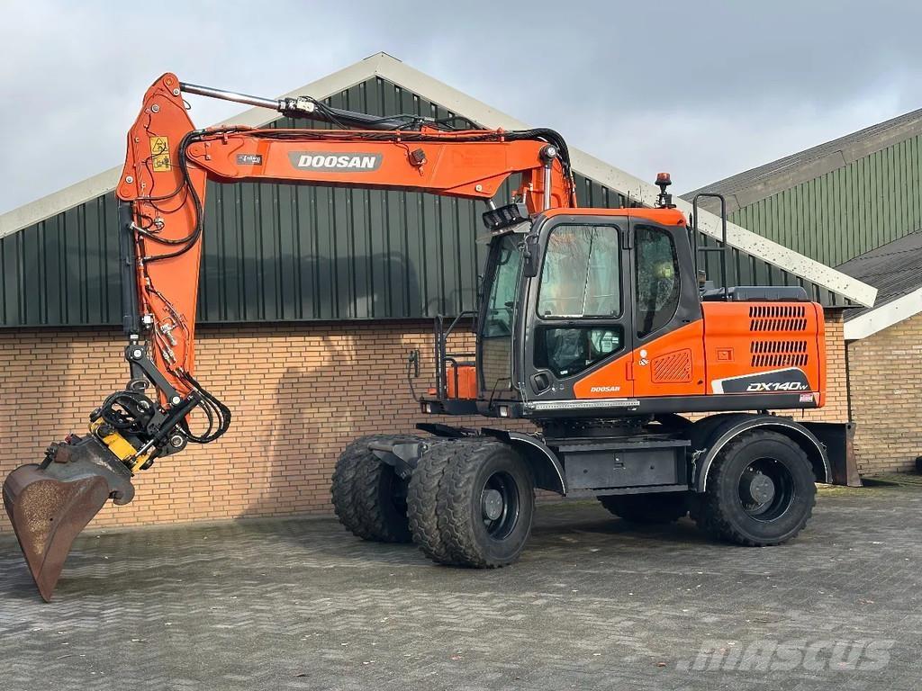 Doosan DX140W-5 حفارات بعجل