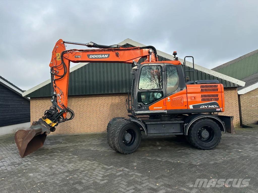 Doosan DX140W-5 حفارات بعجل
