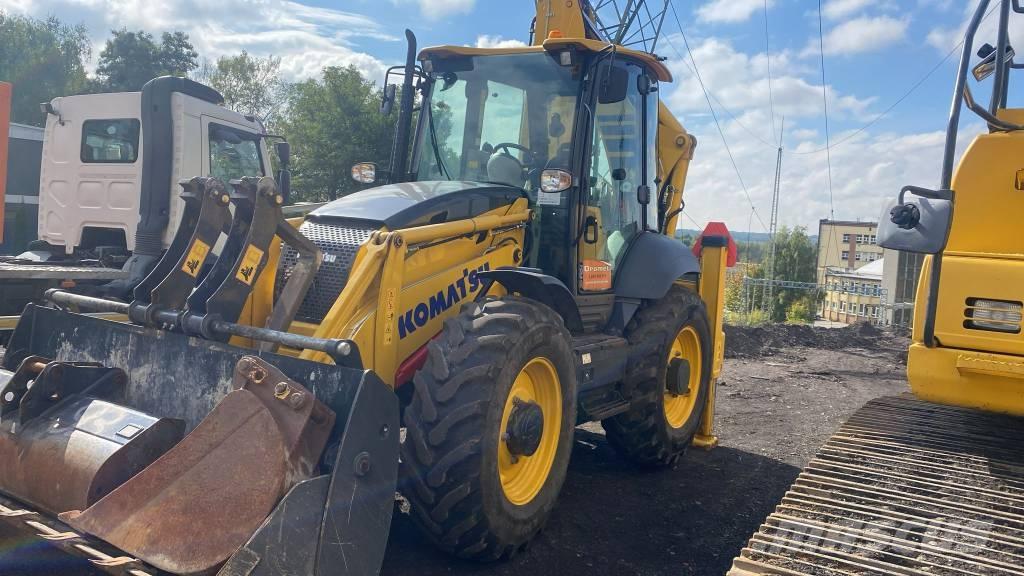 Komatsu WB 93 S لوادر ذات جرافات عكسية
