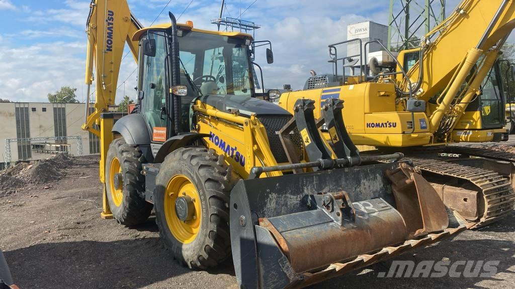 Komatsu WB 93 S لوادر ذات جرافات عكسية