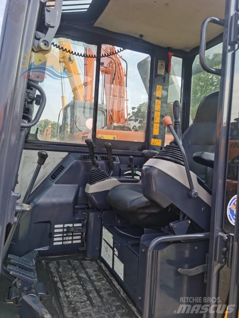 Komatsu PC 56-7 حفارات زحافة