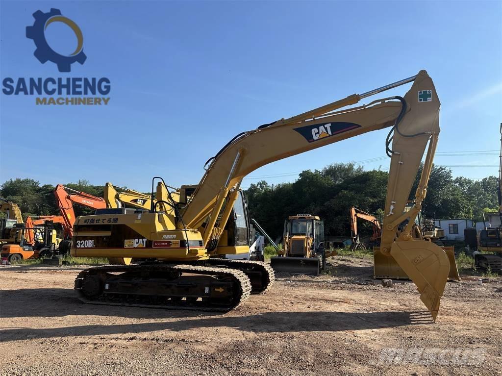 CAT 320 B L حفارات زحافة