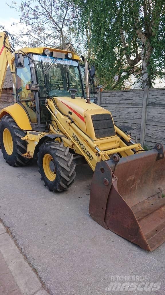 New Holland LB 110 لوادر ذات جرافات عكسية
