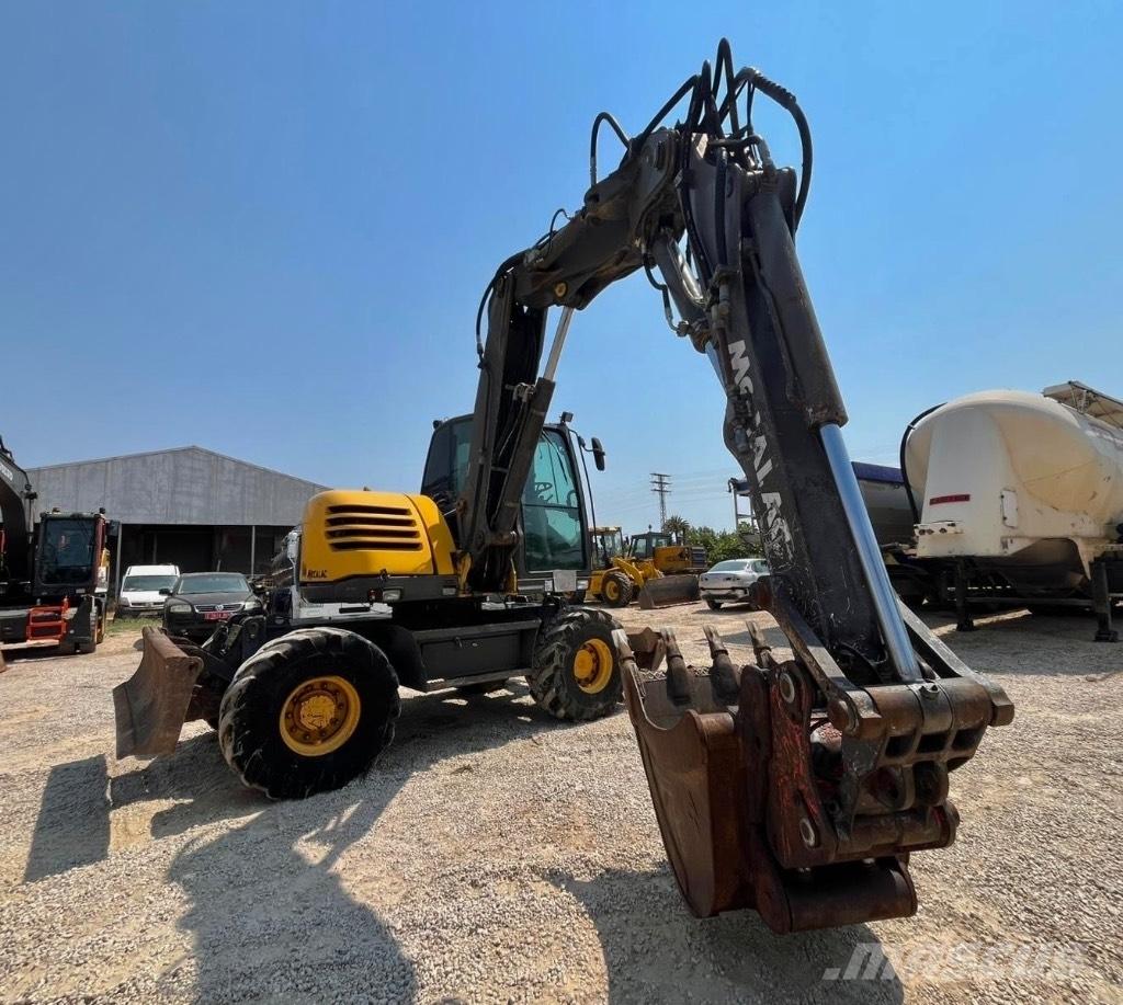 Mecalac 714 MW حفارات بعجل