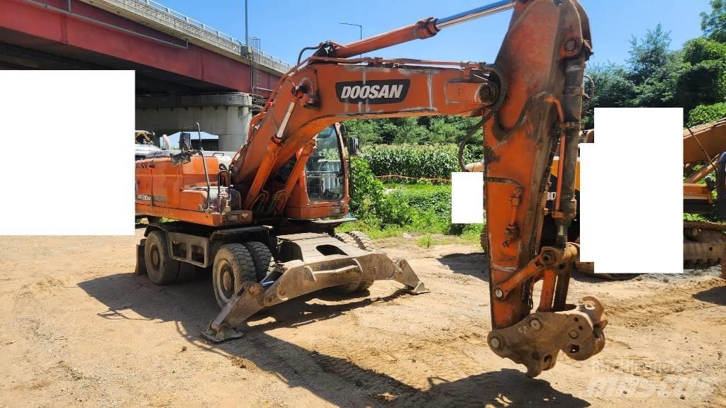 Doosan DX210WA حفارات بعجل