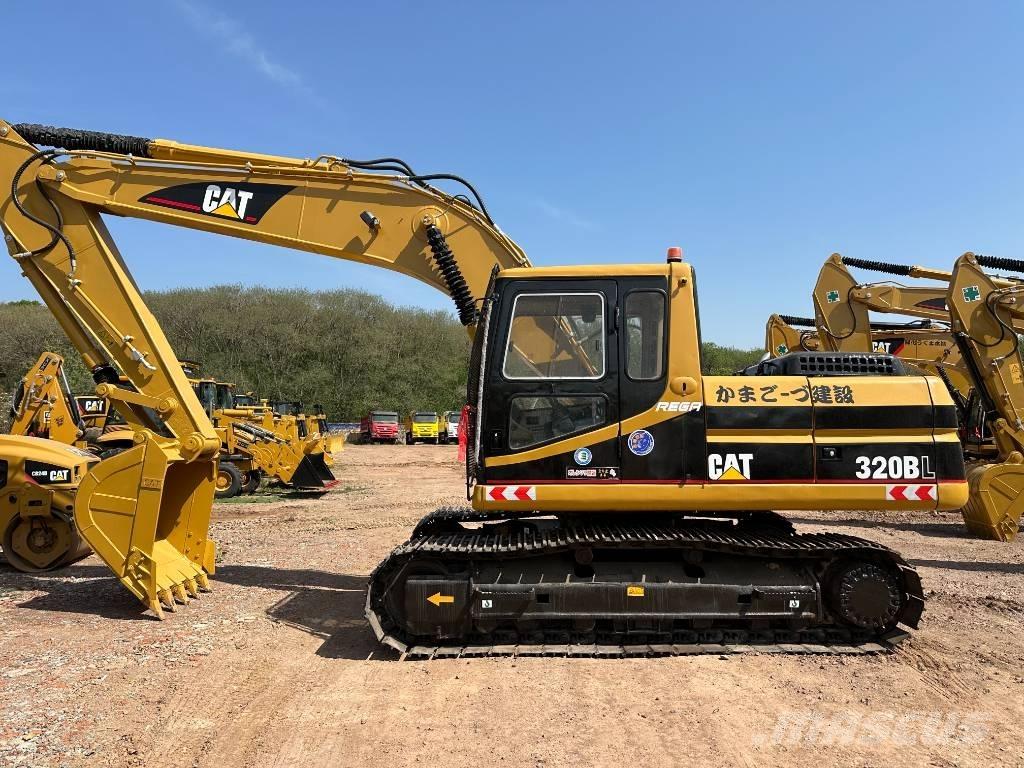 CAT 320 B L حفارات زحافة